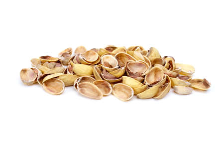 Some pistachio shells isolated on the white background