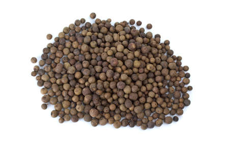 Spices: pile of allspice  isolated on the white backgroundの写真素材