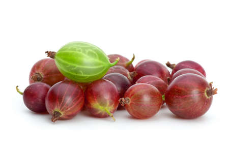 Pile of purple gooseberries and green on the top isolated on the white backgroundの写真素材