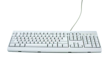 Classic white PC keyboard with english and russian symbol sets isolated on the white background