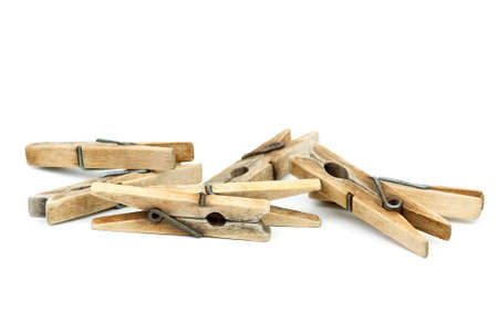 Few wooden clotespins isolated on the white backgroundの写真素材