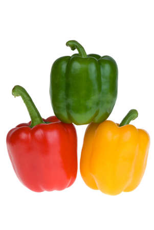 Red, green and yellow bell peppers  isolated on the white backgroundの写真素材