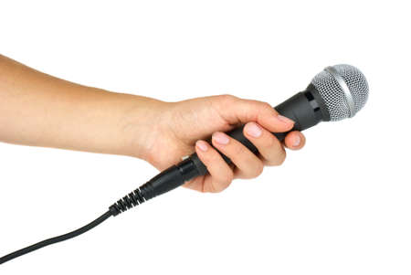 Hand holding microphone  isolated on the white backgroundの写真素材