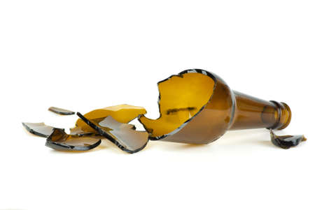 Shattered brown beer bottle  isolated on the white backgroundの写真素材