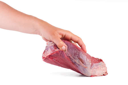 Hand take raw veal slab isolated on white background