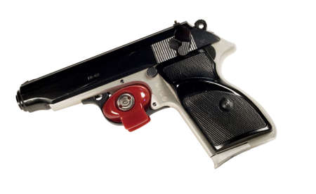 red trigger lock on a pistol の写真素材