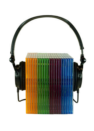 headphones wrapped around numerous compact dics casesの写真素材