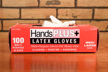RIVER FALLS,WISCONSIN-JANUARY 14,2014:  Box of disposable latex gloves that were first manufactured in 1964 by Ansell.のeditorial素材