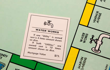 RIVER FALLS,WISCONSIN-FEBRUARY 18,2015: A closeup view of a Monopoly board featuring the Water Works...