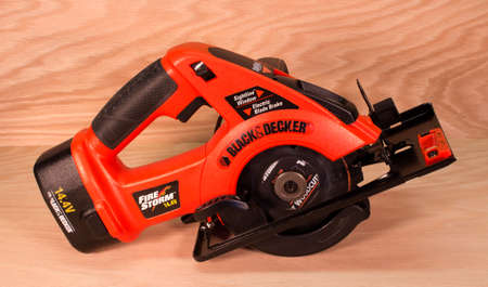 RIVER FALLS,WISCONSIN-MARCH 21,2015: A Fire Storm battery operated circular saw by Black and Decker.のeditorial素材