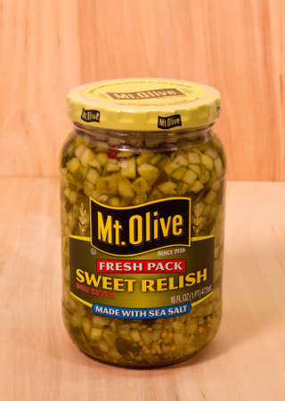 RIVER FALLS,WISCONSIN-APRIL 24, 2015: A jar of Mount Olive sweet pickle relish. Mount Olive Pickle Company is headquartered in North Carolina.のeditorial素材