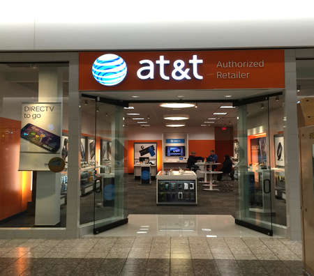 RIVER FALLS,WISCONSIN-FEBRUARY 15,2016: The AT&T sign and retail store.AT&T is one of the largest...