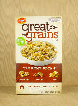 RIVER FALLS,WISCONSIN-JULY 28,2017: A box of Post brand Great Grains cereal with a wood background.のeditorial素材