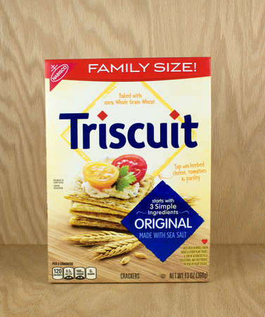 RIVER FALLS,WISCONSIN-AUGUST 01,2017: A box of Triscuit brand snack crackers with a wood background.のeditorial素材