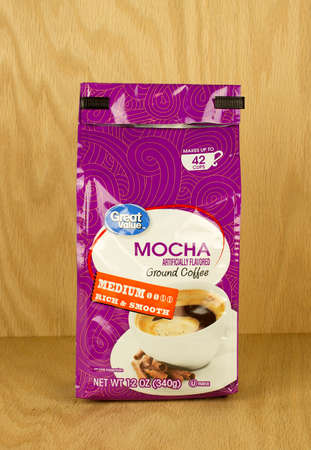 RIVER FALLS,WISCONSIN-AUGUST 06,2017: A bag of Great Value brand mocha flavored coffee with a wood background.のeditorial素材