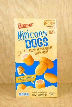 RIVER FALLS,WISCONSIN-AUGUST 24,2017: A box of Bremer brand mini corn dogs with a wood background.のeditorial素材
