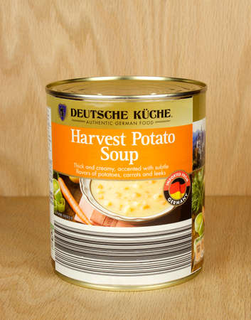 RIVER FALLS,WISCONSIN-SEPTEMBER 12,2017: A can of Harvest Potato soup made in Germany with a wood background.のeditorial素材