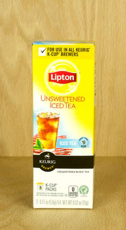 RIVER FALLS,WISCONSIN-SEPTEMBER 15,2017: A box of Lipton tea K-Cups with a wood background.のeditorial素材