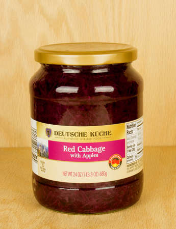 RIVER FALLS,WISCONSIN-SEPTEMBER 24,2017: A jar of red cabbage with apples with a wood background.のeditorial素材