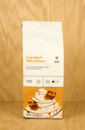 RIVER FALLS,WISCONSIN-SEPTEMBER 27,2017: A bag of Archer Farms brand Caramel Macchiato coffee with a wood background.のeditorial素材