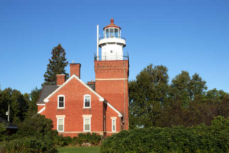 A vintage brick lighthouse located in Big Bay,Michigan on Lake Superior.の写真素材