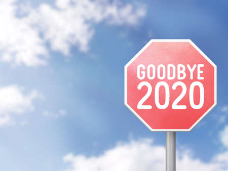 Goodbye 2020 Road sign on blue sky backgroundの写真素材