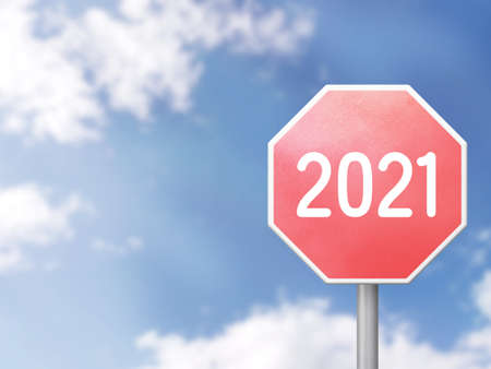 2021 Road sign on blue sky backgroundの写真素材
