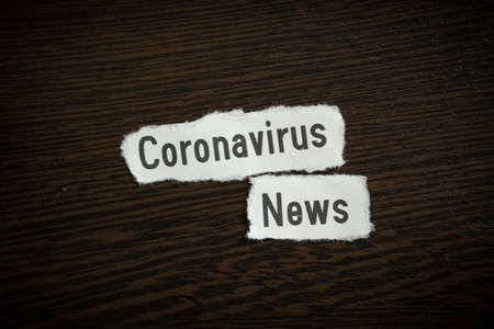 Coronavirus news - Scrap pieces of paperの写真素材
