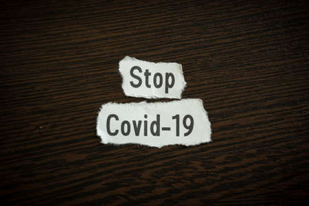 Stop Covid-19 - Scrap pieces of paperの写真素材