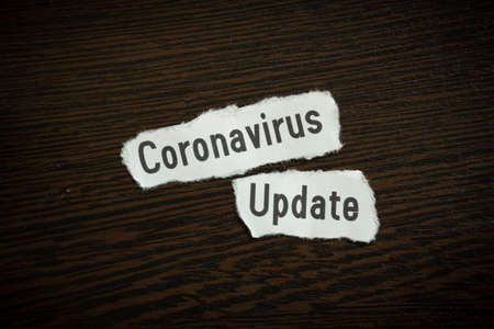 Coronavirus update - Scrap pieces of paperの写真素材