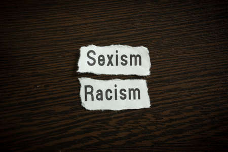 Sexism racism - Scrap pieces of paperの写真素材