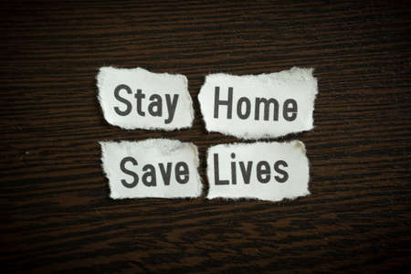Stay home save lives - Scrap pieces of paperの写真素材