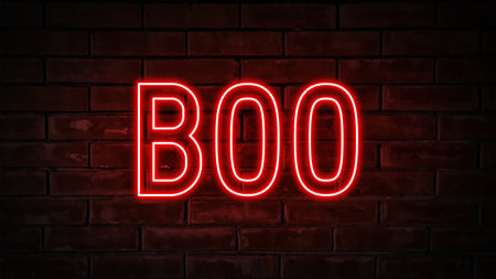 Boo - red neon light word on brick wall backgroundの写真素材