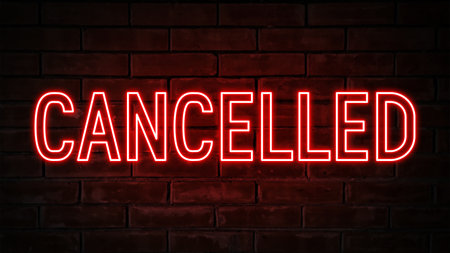 Canceled - red neon light word on brick wall backgroundの写真素材
