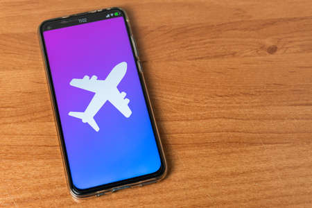 Phone with airplane symbolの写真素材