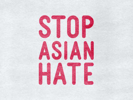 Stop Asian Hate - word on a gray textured backgroundの写真素材