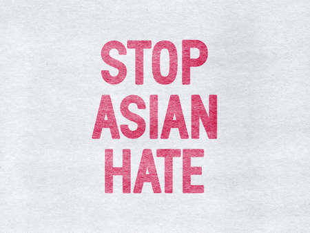 Stop Asian Hate - word on a gray textured backgroundの写真素材