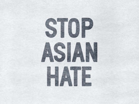 Stop Asian Hate - word on a gray textured backgroundの写真素材