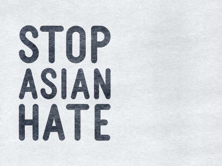 Stop Asian Hate - word on a gray textured backgroundの写真素材