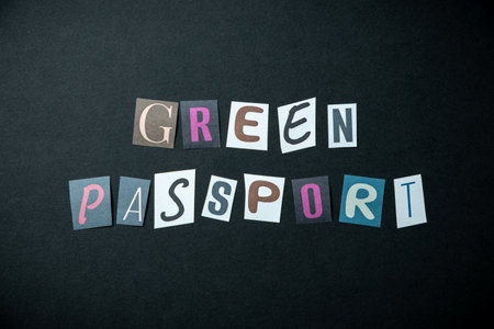Green passport words. Caption, heading made of letters with different fonts on a dark background.の写真素材