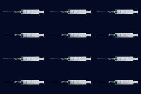 Seamless pattern with medical syringe and needle on dark backgroundの写真素材