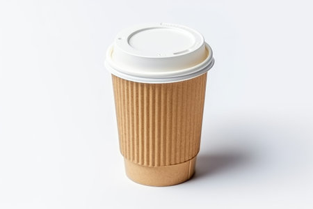 Coffee to go on white background. Paper cup with lid.の素材