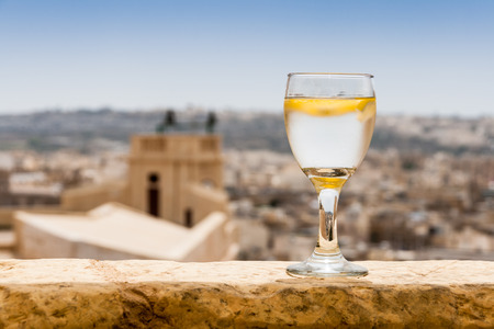 Glass of fresh water in sunlight of Gozo, Maltaの写真素材