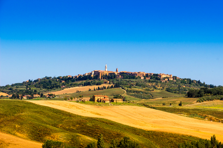 Road and cypresses on a hill near Pienza in Val d'Orcia, Tuscany, Italyのeditorial素材