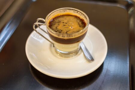 Cafe bombon is a mix made of espresso and condensed milk, popular in Spainの写真素材