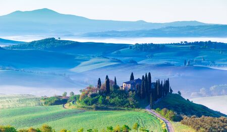 Siena, Italy - May 02, 2019: an iconic landscape in Orcia valley, Tuscany, in spring at sunrise.のeditorial素材