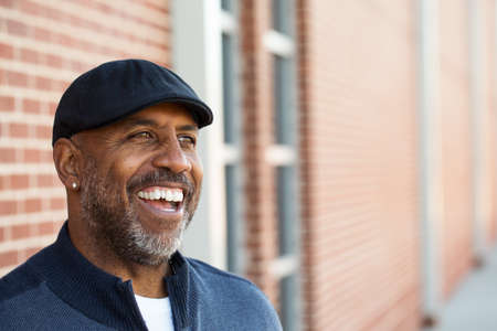 Portrait of an African American sitting outside.の写真素材