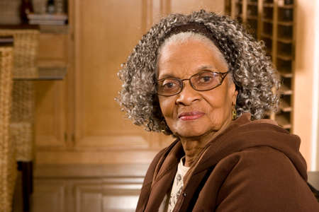 Happy elderly African American woman at her house.の写真素材
