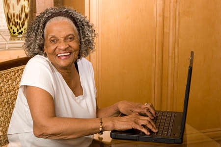 Elderly African American woman working on the computer.の写真素材