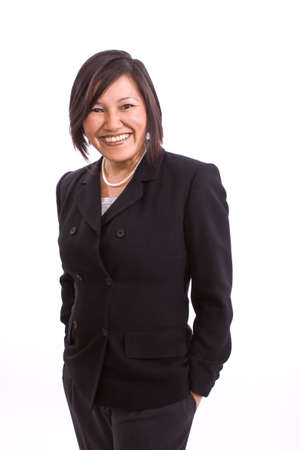Asian businesswoman smiling isolated on white.の写真素材